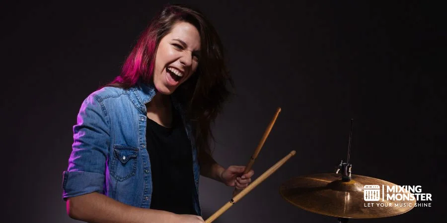 Woman Enjoying Playing Drums Woman Enjoying Playing Drums
