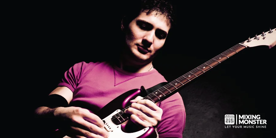 Guitarist Playing The Electric Guitar Guitarist Playing The Electric Guitar